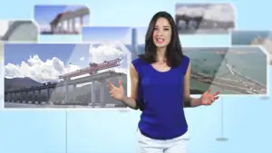 A woman with shoulder-length dark hair, wearing a blue sleeveless top and white pants, stands smiling with her hands raised. Behind her are several images of bridges and construction scenes, suggesting a promotional video or animation on a light blue background.