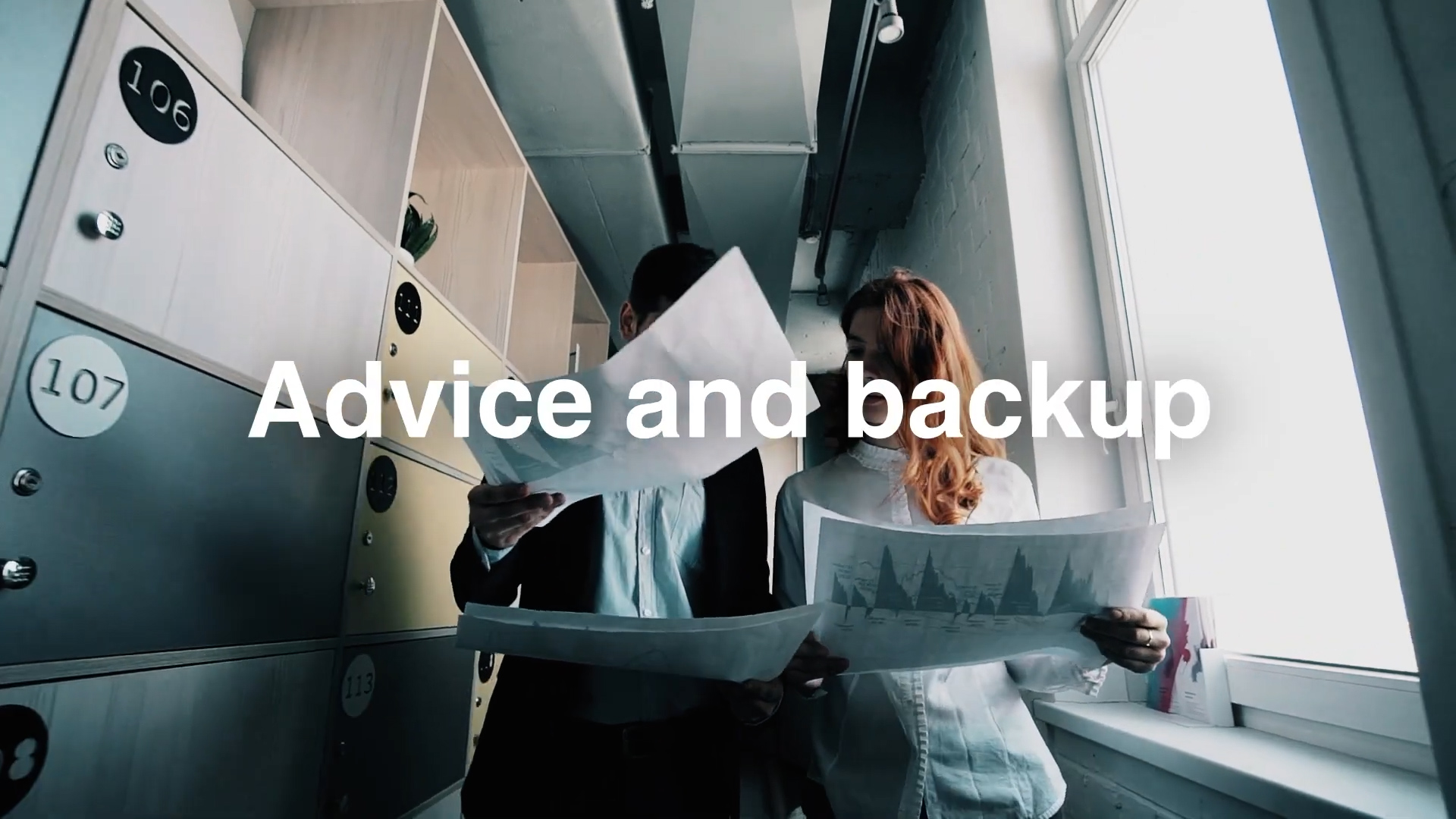 Two people holding large papers stand in a modern office hallway near lockers and windows, with the words "Advice and backup" in bold white text across the image.