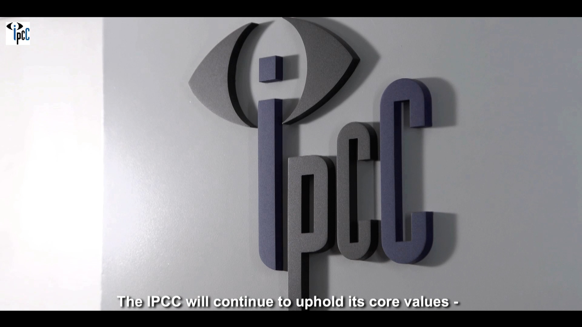A wall features a 3D logo of the IPCC with an eye design above the letters. At the bottom, text reads, "The IPCC will continue to uphold its core values -".